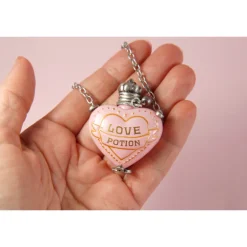 Colgante y Expositor Poción de Amor Harry Potter