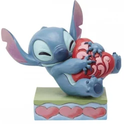 Figura Enesco Disney Stitch con Corazón Rojo 13 cm